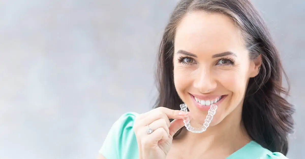 DO I HAVE TO TAKE MY INVISALIGN ALIGNERS OUT TO EAT?